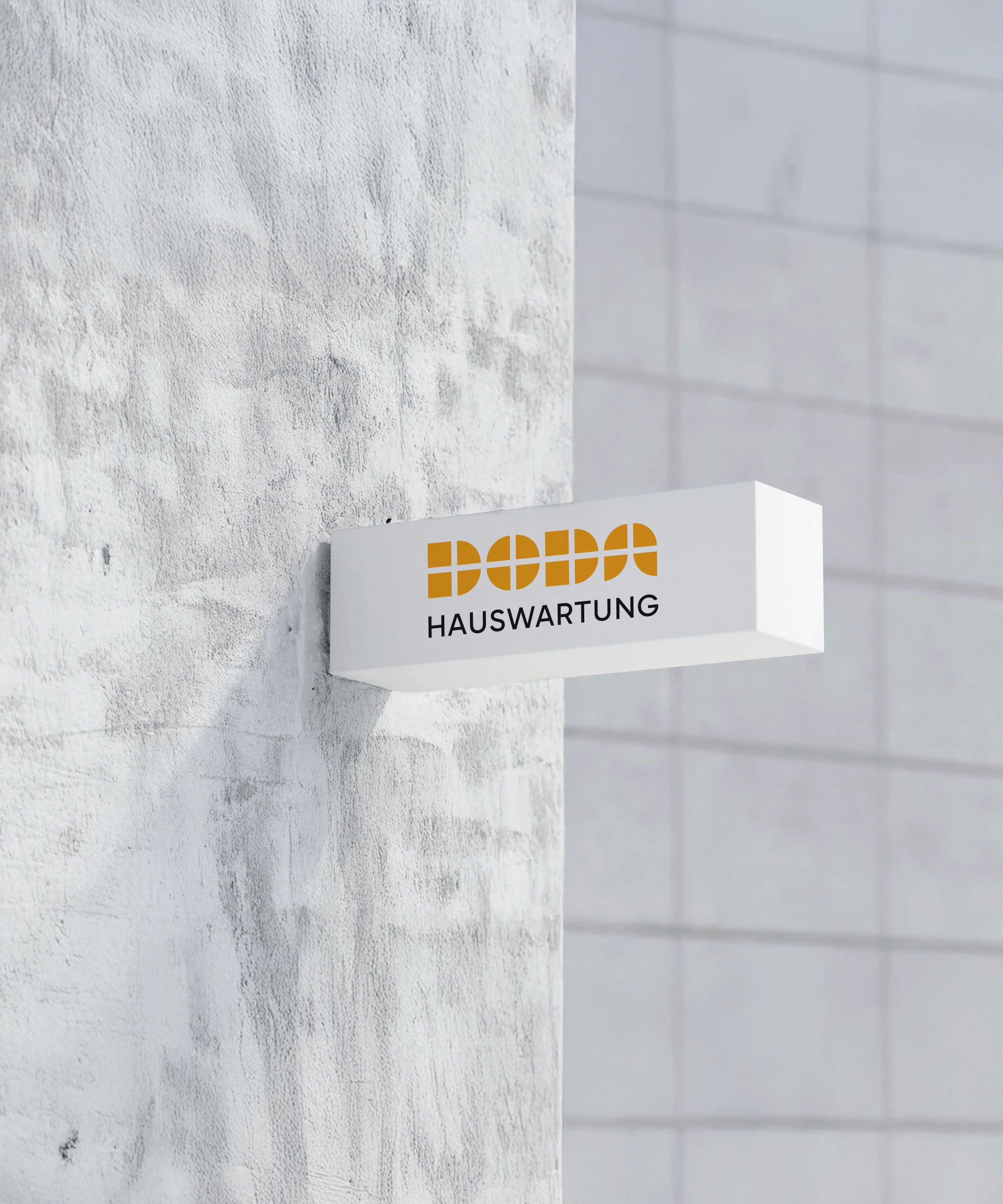Doda Hauswartung Schild an einer Fassade
